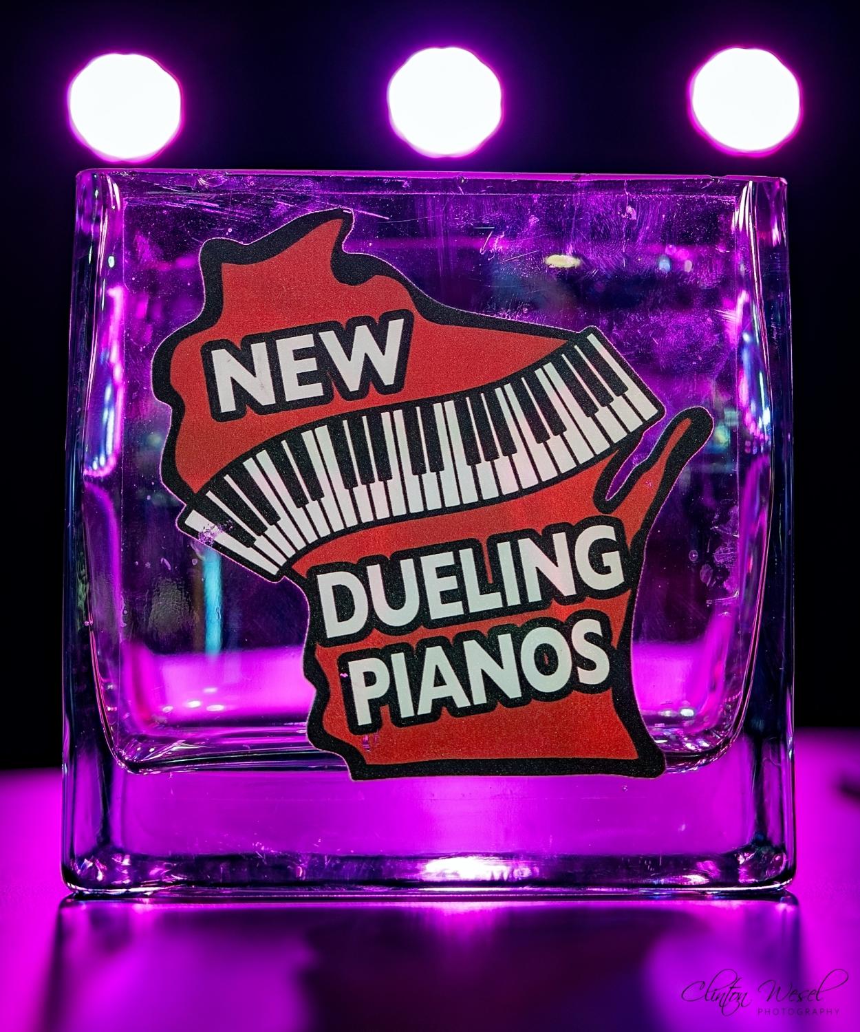NEW DUELING PIANOS