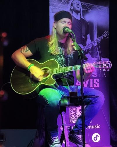TRAVIS JOHN