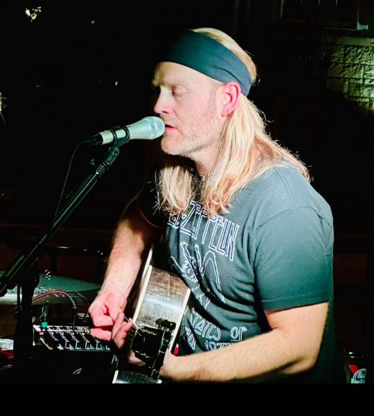 TRAVIS JOHN