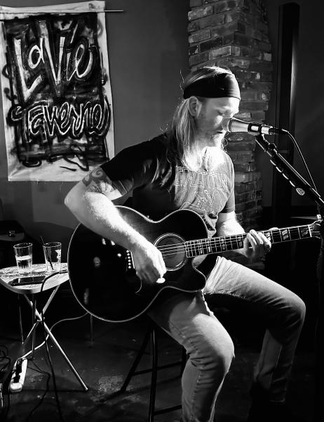TRAVIS JOHN